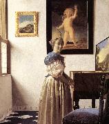 VERMEER VAN DELFT, Jan, Lady Standing at a Virginal er